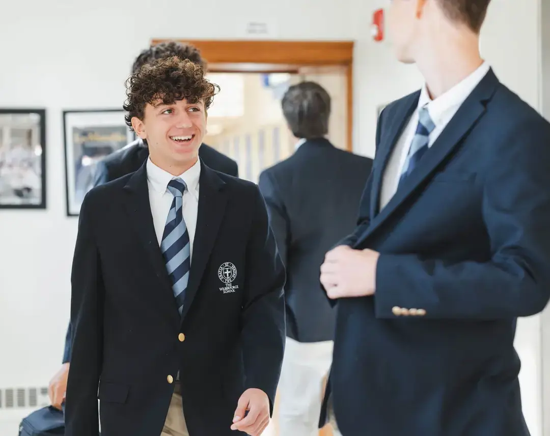 Students chatting and laughing together at The Wilberforce School.